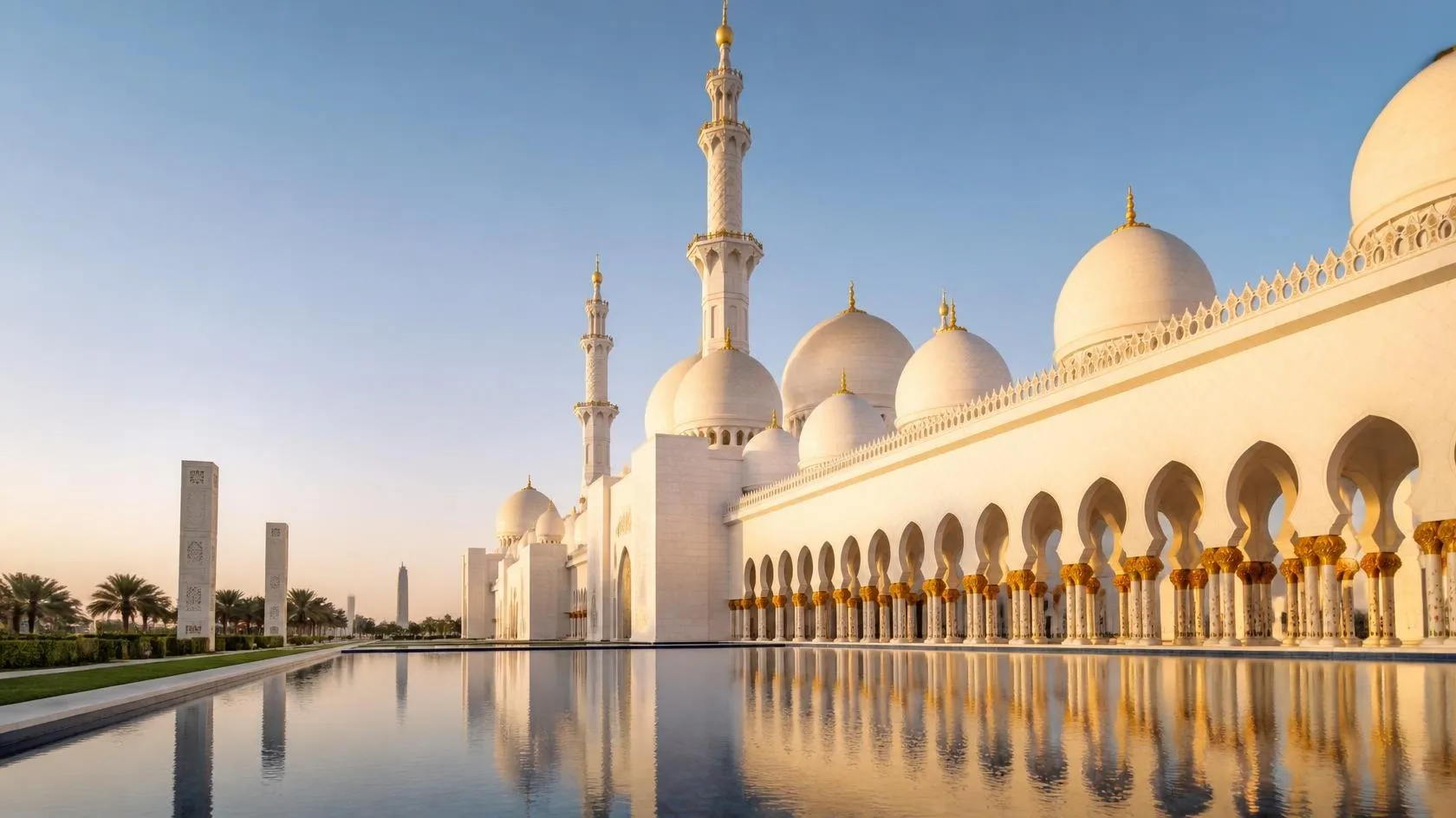 White marble grand mosque with domes and reflecting pools, Abu Dhabi